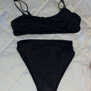 Tan lines black bikini